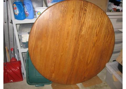 Double pedestal Oak 48 inch round table / 6 chairs and 2 leafs